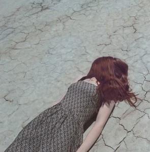 woman laying on floor